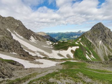 beautiful valley at the fiderepass hut in the alps clipart