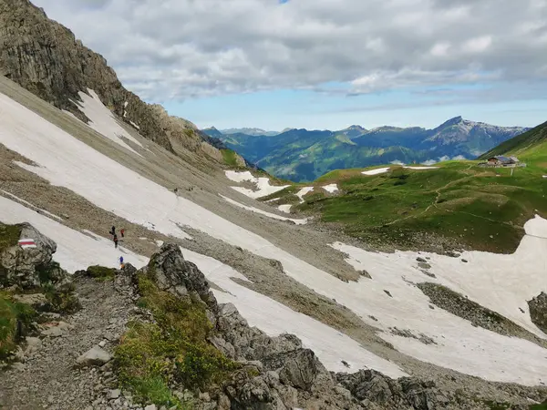 stock image passing a snow field near fiderepass hut