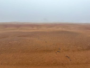 red sand landscape on santa maria island, azores clipart