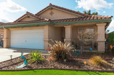 Santa Maria, California, USA - January 17, 2023. Beautiful houses with nicely landscaped front the yard in small town in California.