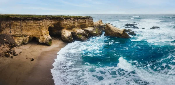 Stock image Dramatic coastline landscape, pano. Rocky Cliffs, Pacific Ocean, and native plants on the beach, Montana de Oro State Park, California Central Coast.