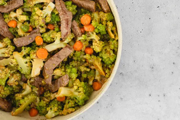 Beef and broccoli with stir fry sauce recipe. Delicious meal close-up, flat lay, copy space
