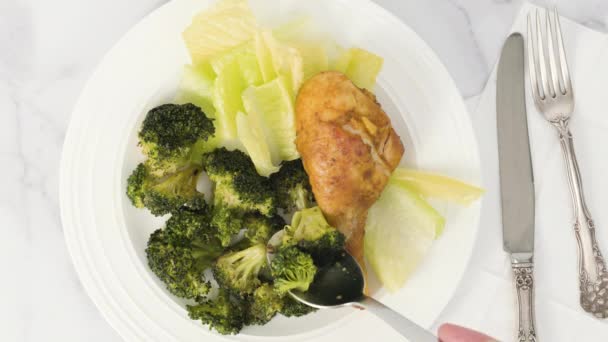 Baked Chicken Drumsticks Broccoli Recipe Meal White Plate Flat Lay — Stock Video