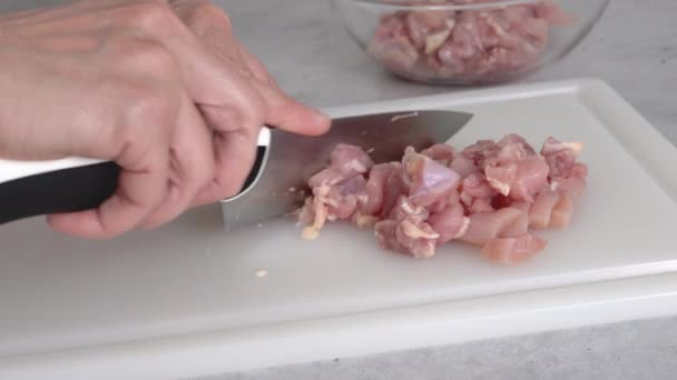 Chef Cuts Raw Chicken Meat White Plastic Cutting Board Close — Stock Video
