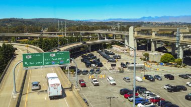 San Francisco, California, USA. August 2, 2024. Elevated highways and parking areas surround San Francisco International Airport. clipart