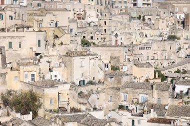 View of Sassi di Matera a historic district in the city of Matera, well-known for their ancient cave dwellings from the Belvedere di Murgia Timone, Basilicata, Italy