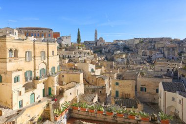 View of Sassi di Matera a historic district in the city of Matera, well-known for their ancient cave dwellings from the Belvedere di Murgia Timone, Basilicata, Italy