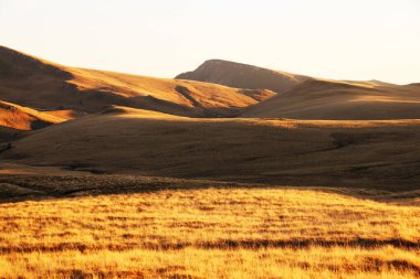Autumn alpine landscape of Bucegi Mountains in sunset light, Romania, Europe