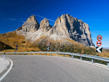 View of Sassolungo and Sassopiatto mountains of the Langkofel Group in Seiser Alm, Dolomites, Italy, Europe clipart