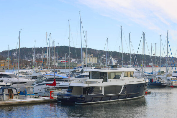 Touristic view of Oslo harbour near Aker Brygge neighbourhood, Norway, Europe