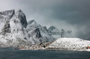 Winter evening in Reine Lofoten Islands Norway clipart