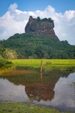 Sigiriya Fortress Rock is an ancient rock fortress located in the northern Matale District near the town of Dambulla in the Central Province, Sri Lanka clipart