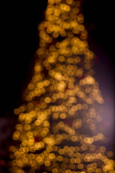 Christmas trees lights. Christmas garland blurred out. Defocused Stock Photo.