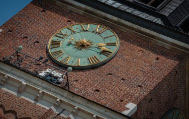 Close up Clock at the Wawel Cathedral at the Rynek, Old City Centre. Architecture of an Old European City.