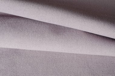 Açık bej ve gri renkli kadife kumaş örnekleri. Kumaş dokusu arkaplanı