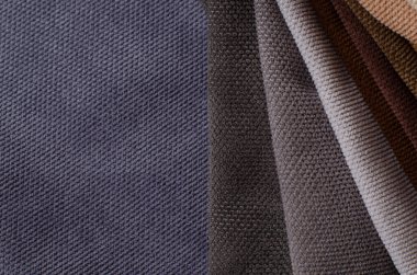 Light Set Yelken Şampanyası ve çikolata rengi kadife kumaş örnekleri. Kumaş dokusu arkaplanı