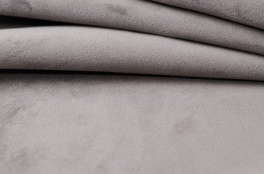 Gri yumuşak kadife kumaş örnekleri... Kumaş dokusu arkaplanı.