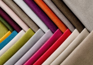 Bright collection of colorful velour textile samples. Fabric texture background clipart