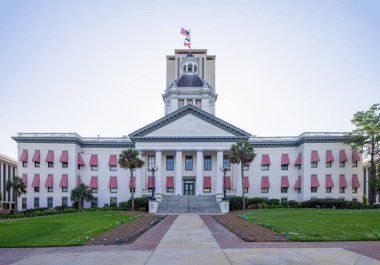 Tallahassee, Florida, USA - April 18, 2022: The Old Florida State Capitol, now a museum, with the new Capitol in the background