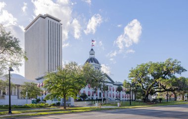 Tallahassee, Florida, USA - April 18, 2022: The Old Florida State Capitol, now a museum, with the new Capitol in the background