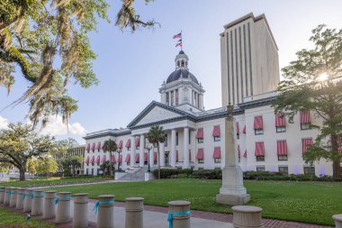 Tallahassee, Florida, USA - April 18, 2022: The Old Florida State Capitol, now a museum, with the new Capitol in the background
