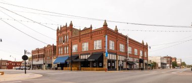 Okmulgee, Oklahoma, USA - October 16, 2022: The old business district on 6th Street and Morton Avenue