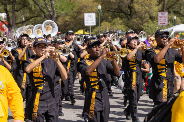 San Antonio, Texas, USA - April 8, 2022: The Battle of the Flowers Parade, The Brennan High School Band Performing at the parade