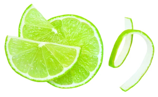 緑色のライム柑橘類の果実の熟したスライスは白い背景に隔離されたスタンド 石灰の皮を閉じるU — ストック写真