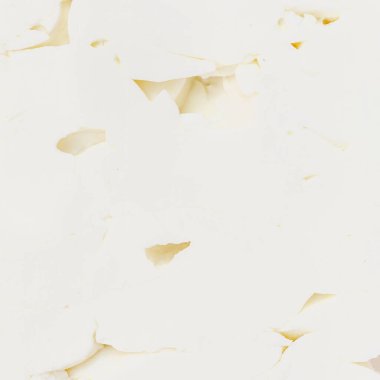 Feta peyniri desenli arka plan. Taze Yunan peyniri bloğu kapanıyor. Patter