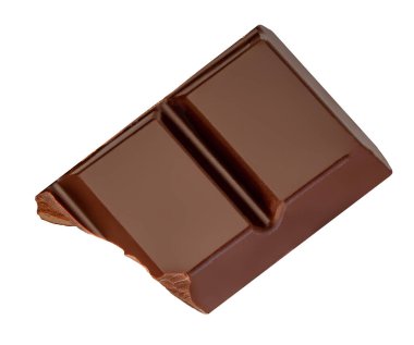 Beyaz arka planda izole edilmiş lükslü çikolata parçası. Çikolata parçacıkları Top view 'de. Düz yatıyordu