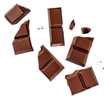 Beyaz arka planda izole edilmiş sütlü çikolata parçaları patlaması. Düşen Lüks Çikolata Üst Görüş Alanı. Düz la