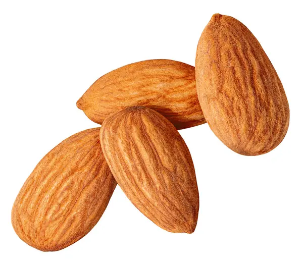 Bademler beyaz arka planda izole edilmiş. Kahverengi kabuklu badem fıstığı yığını. Badem Üst Manzara. Düz yatıyordu. Paket tasarım elementi