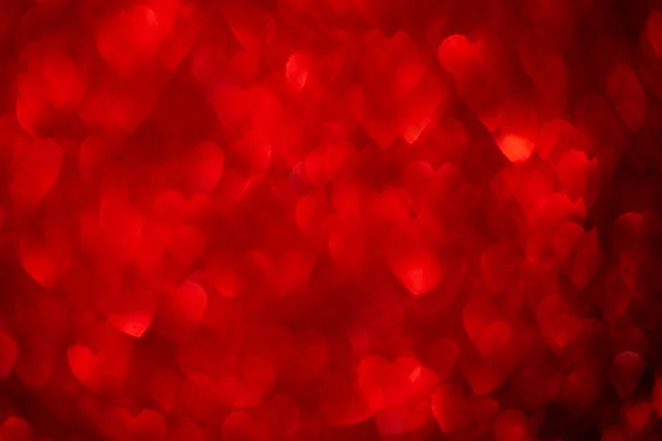 赤いハート キラキラしたボケの背景 バレンタインデーの抽象的な焦点を当てたテクスチャ — ストック写真