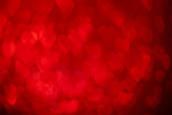 Rode Harten Sprankelende Glitter Bokeh Achtergrond Valentijnsdag Abstracte Onscherpe Textuur — Stockfoto