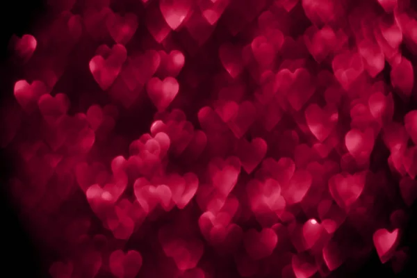 2023年のトレンディーなビブラマゼンタ色 ピンク赤の心 輝く輝きボケの背景 バレンタインデー抽象的な集中的なテクスチャ — ストック写真