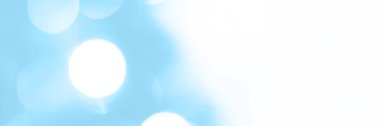 Blurred lights blue background, banner texture. Abstract bokeh with soft light header. Wide screen wallpaper. Panoramic web banner with copy space for design