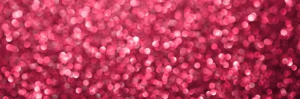 Viva magenta, pink sparkling glitter bokeh panoramic background banner, abstract defocused texture header. Holiday romantic lights