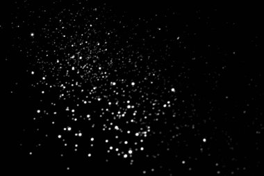 White gray blurred bokeh lights on black background. Glitter sparkle stars for celebrate. Overlay for your design