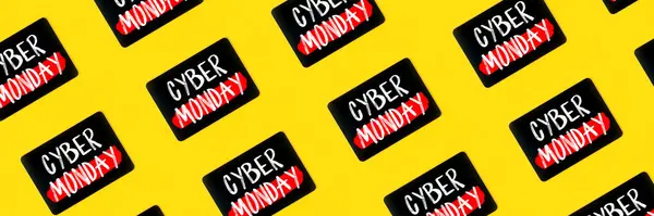 Pattern Cyber Monday sign on digital tablet on bright yellow background banner. Shopping concept panoramic web header