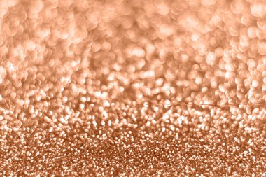 Şeftali tüyü ışıltılı ışıltılı arka plan, soyut odaklanmış doku. Tatil ışıkları