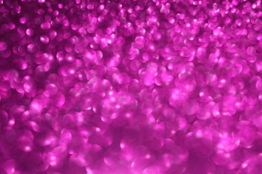 Pembe lacivert ışıltılı arka plan, sönmüş parlak ışıklar, soyut parlak doku. Tatil ışıkları.