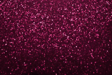 Pembe ışıltılı arka plan, sönmüş parlak ışıklar, soyut parlak doku. Tatil ışıkları.