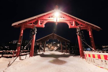 View of The Old Bridge ( den Gamle Bybro) in the snowy nightly Trondheim
