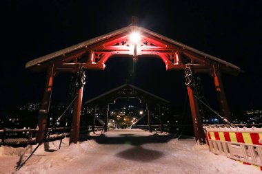 View of The Old Bridge ( den Gamle Bybro) in the snowy nightly Trondheim