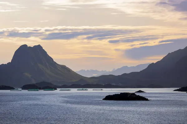 stock image Sunset at the Lofoten islands, mountains near the town Stamsund. View from the cruise ship Hurtigruten.