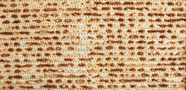 Pesach kutlaması konsepti - Yahudi bayramı Pesach. Pankart ve ekran koruyucuları için matzah 'tan doku arkaplanı.