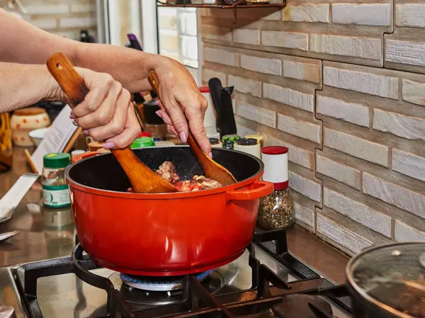Chef Stirs Meat Frying Pan Gas Stove Stock Image