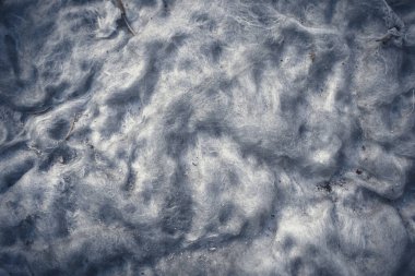 Eski matress 'in beyaz kirli pamuk arka planı. Üst arkaplanı kapatıyor.