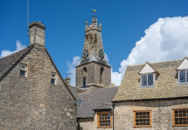 The parish church of The Holy Trinity in Minchinhampton, Gloucestershire, UK. Minchinhampton is an ancient market town near to Stroud in The Cotswolds. clipart