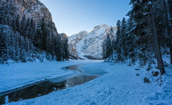 stock image A cold winter morning at a snowy and iced Lake Braies, Province of Bolzano, Trentino Alto Adige, Italy.